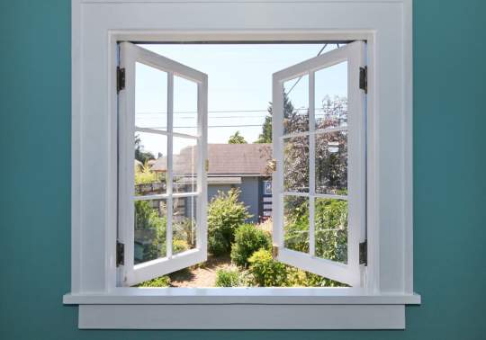 window with glass panes and doors that swing out